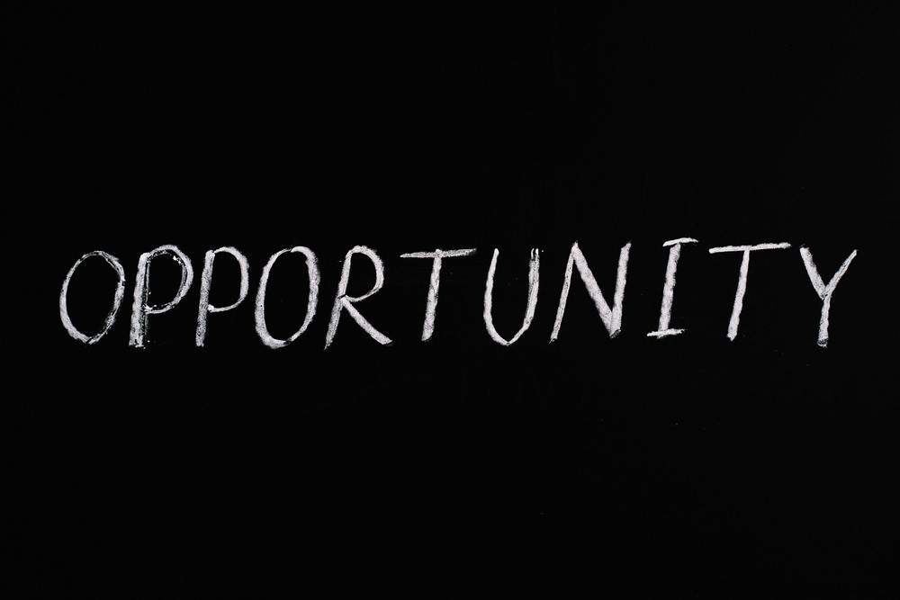 The word opportunity written on a chalk board