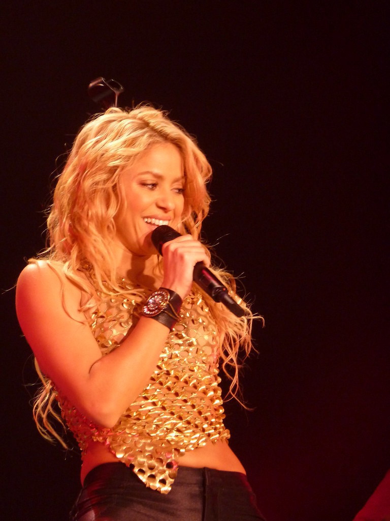 Shakira Holding a Microphone